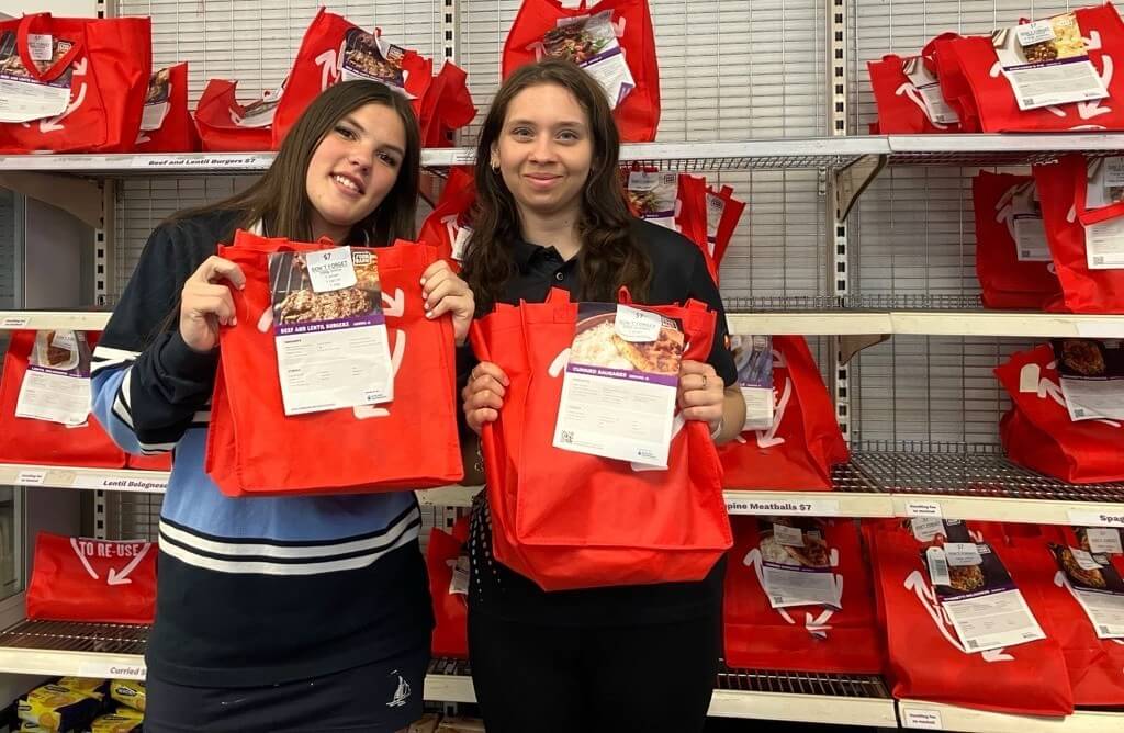 Stars students from Ocean View College in Adelaide helping pack food parcels for Foodbank South Australia as part of a community support activity.